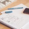 web-designer-sketching-a-wireframe-layout-ideas-in-a-notebook-picjumbo-com