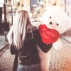 yong-woman-holding-her-big-valentines-day-gift-teddy-bear-picjumbo-com